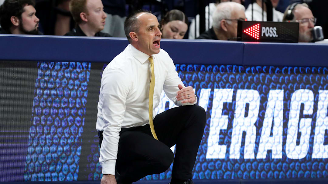 Feb 28, 2026; University Park, Pennsylvania, USA; Iowa Hawkeyes head coach Ben McCollum looks on from the bench during the first half against the Penn State Nittany Lions at Bryce Jordan Center. Mandatory Credit: Matthew O'Haren-Imagn Images