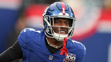Dec 29, 2024; East Rutherford, New Jersey, USA; New York Giants wide receiver Malik Nabers (1) celebrates after a touchdown reception during the second half against the Indianapolis Colts at MetLife Stadium. Mandatory Credit: Vincent Carchietta-Imagn Images