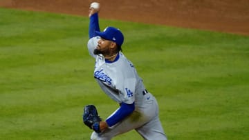 May 8, 2021; Anaheim, California, USA; Los Angeles Dodgers relief pitcher Dennis Santana (77) throws a pitching during the Dodgers 14-11 win over the Los Angeles Angels at Angel Stadium. Mandatory Credit: Robert Hanashiro-USA TODAY Sports