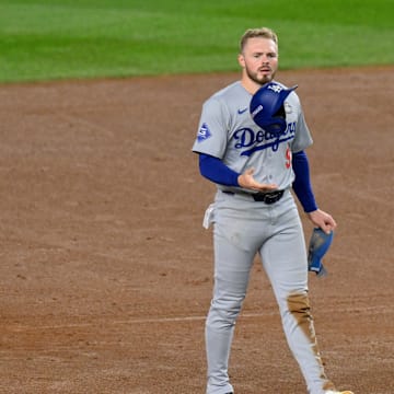 Oct 29, 2024; New York, New York, USA; Los Angeles Dodgers second baseman Gavin Lux (9) reacts after being caught in a double play during the second inning against the New York Yankees in game four of the 2024 MLB World Series at Yankee Stadium. Mandatory Credit: John Jones-Imagn Images