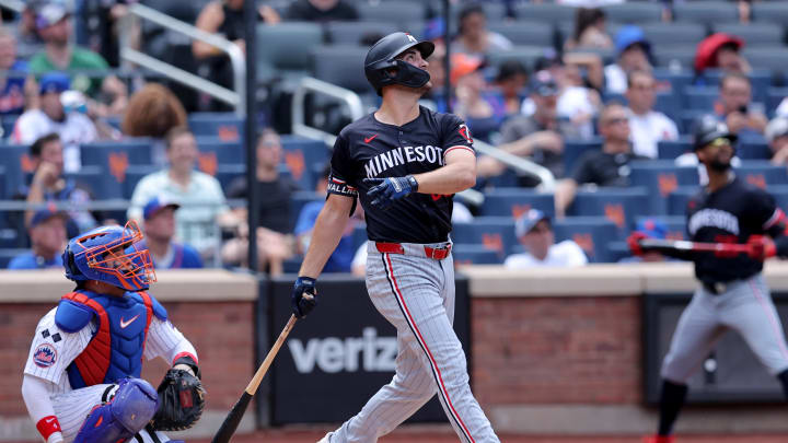 Jul 31, 2024; New York City, New York, USA; Minnesota Twins designated hitter Matt Wallner (38) follows through on a double against the New York Mets during the fifth inning at Citi Field. Mandatory Credit: Brad Penner-USA TODAY Sports