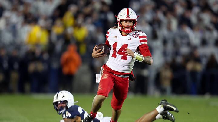 Nov 22, 2025; University Park, Pennsylvania, USA; Nebraska Cornhuskers quarterback TJ Lateef (14) runs with the ball during the third quarter against the Penn State Nittany Lions at Beaver Stadium. Mandatory Credit: Matthew O'Haren-Imagn Images