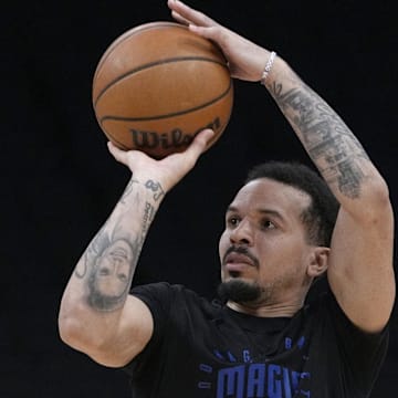 Former Orlando Magic guard Cole Anthony (50) puts up a shot during pregame warmups before a game against the Milwaukee Bucks at Fiserv Forum. 