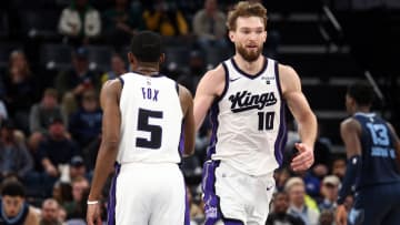 Jan 29, 2024; Memphis, Tennessee, USA; Sacramento Kings forward Domantas Sabonis (10) reacts with guard De'Aaron Fox (5) during the second half against the Memphis Grizzlies at FedExForum. Mandatory Credit: Petre Thomas-USA TODAY Sports