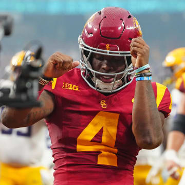 Sep 1, 2024; Paradise, Nevada, USA; Southern California Trojans running back Woody Marks (4) celebrates after scoring a touchdown against the LSU Tigers during the second quarter at Allegiant Stadium.