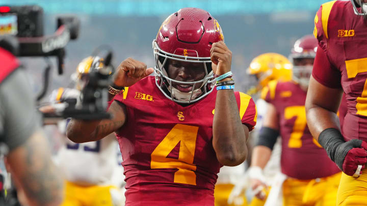 Sep 1, 2024; Paradise, Nevada, USA; Southern California Trojans running back Woody Marks (4) celebrates after scoring a touchdown against the LSU Tigers during the second quarter at Allegiant Stadium.