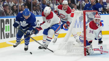 Oct 11, 2023; Toronto, Ontario, CAN; Toronto Maple Leafs center Max Domi (11) battles for  the puck