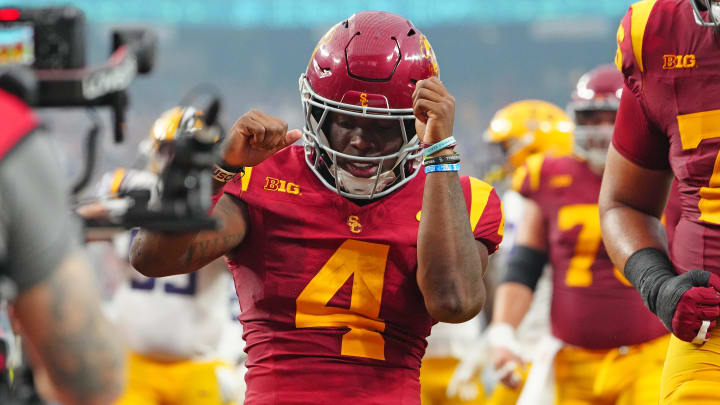 Sep 1, 2024; Paradise, Nevada, USA; Southern California Trojans running back Woody Marks (4) celebrates after scoring a touchdown against the LSU Tigers during the second quarter at Allegiant Stadium. Mandatory Credit: Stephen R. Sylvanie-USA TODAY Sports