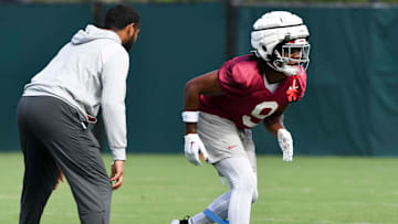 The Crimson Tide football team continued practice Thursday, Aug. 1, 2024, as they prepare for the season opener and the first game under new head coach Kalen DeBoer. Alabama defensive back Jaylen Mbakwe (9) runs a drill using a band to restrict his lower legs.