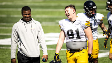 Apr 26, 2025; Iowa City, IA, USA; Iowa defensive lineman Jonah Pace (91) laughs with teammates during a spring NCAA football open practice at Kinnick Stadium. Mandatory Credit: Joseph Cress/For the Register