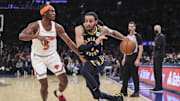 Jan 4, 2022; New York, New York, USA;  Indiana Pacers guard Duane Washington Jr. (4) drives past New York Knicks guard Immanuel Quickley (5) in the second quarter at Madison Square Garden. Mandatory Credit: Wendell Cruz-Imagn Images