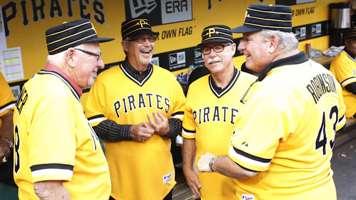 May 21, 2014; Pittsburgh, PA, USA; Members of the Pittsburgh Pirates 1979 World Series championship team Bob Skinner (L) and Tim Foli (LC) and Phil Garner (RC) and Don Robinson (43) reminisce in the dugout before the Pirates host the Baltimore Orioles at PNC Park. The Pirates won 9-8. Mandatory Credit: Charles LeClaire-Imagn Images