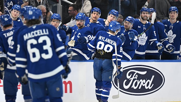 Dec 23, 2025; Toronto, Ontario, CAN;  Toronto Maple Leafs forward William Nylander (88) celebrates with team mates at the bench after scoring a goal against the Pittsburgh Penguins in the first period at Scotiabank Arena. Mandatory Credit: Dan Hamilton-Imagn Images