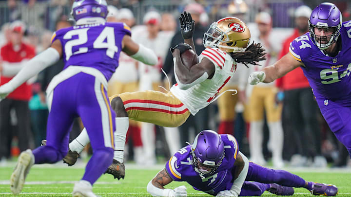 Oct 23, 2023; Minneapolis, Minnesota, USA; San Francisco 49ers wide receiver Brandon Aiyuk (11) is tackled by Minnesota Vikings cornerback Byron Murphy Jr. (7) in the second quarter at U.S. Bank Stadium.