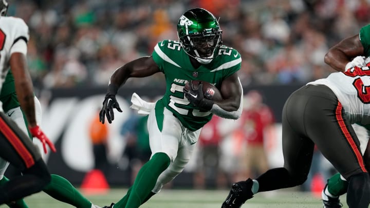 New York Jets running back Israel Abanikanda (25) rushes with the ball in the second half. The Buccaneers defeat the Jets, 13-6, in a preseason NFL game at MetLife Stadium on Saturday, Aug. 19, 2023, in East Rutherford.