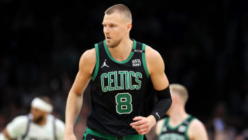 Jun 9, 2024; Boston, Massachusetts, USA; Boston Celtics center Kristaps Porzingis (8) reacts after a play against the Dallas Mavericks during the first quarter in game two of the 2024 NBA Finals at TD Garden. Mandatory Credit: Peter Casey-USA TODAY Sports