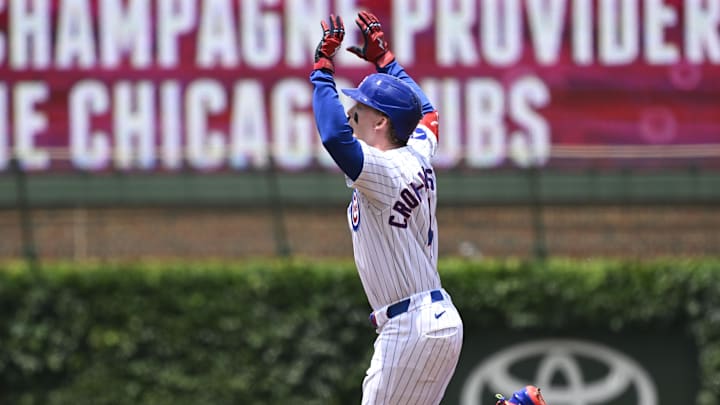 Chicago, Illinois, USA; Chicago Cubs outfielder Pete Crow-Armstrong (4) reacts after he hits a two-run home run against the Milwaukee Brewers during the first inning at Wrigley Field.