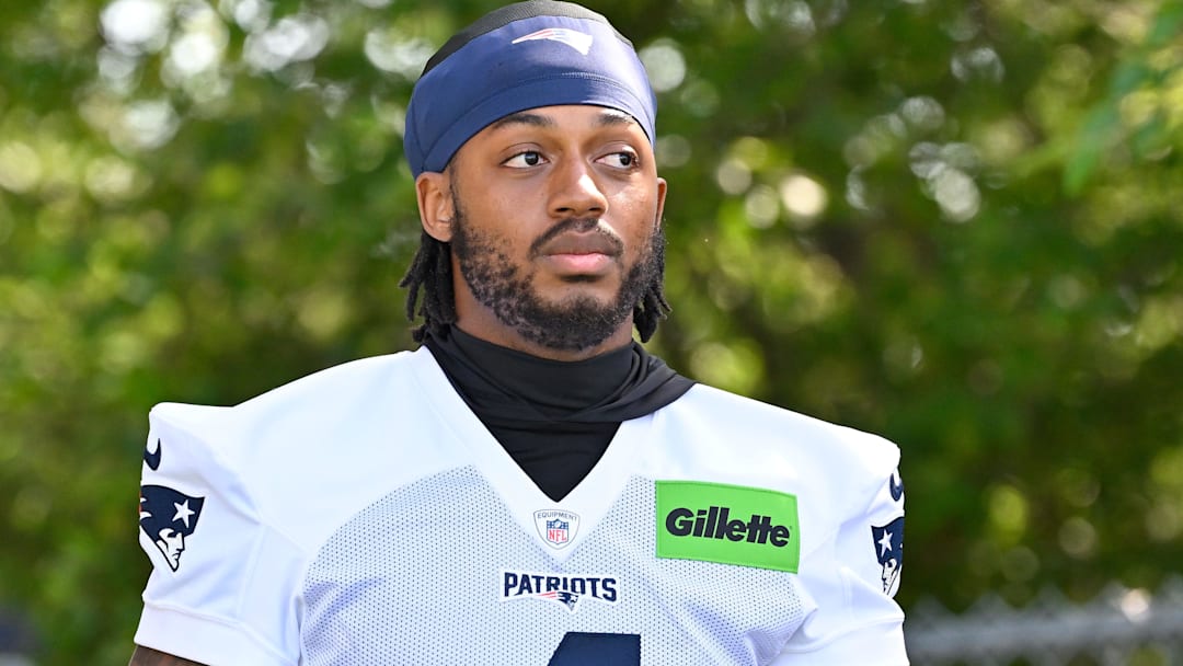 Jul 23, 2025; Foxborough, MA, USA; New England Patriots running back Antonio Gibson (4) walks to the practice field for training camp at Gillette Stadium.