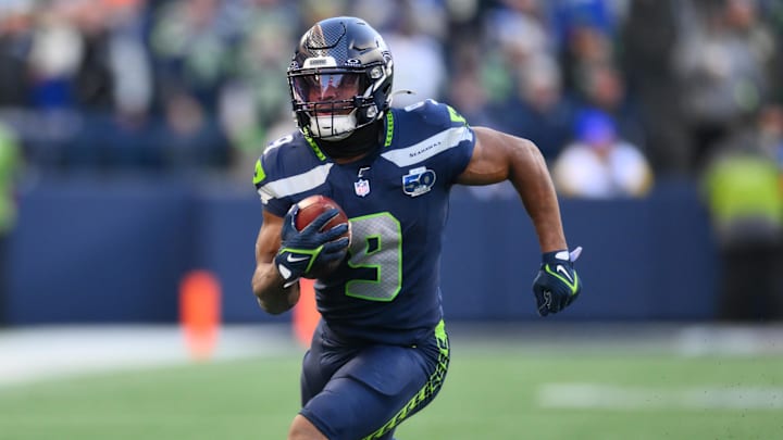 Jan 25, 2026; Seattle, WA, USA; Seattle Seahawks running back Kenneth Walker III (9) runs against the Los Angeles Rams in the first half in the 2026 NFC Championship Game at Lumen Field. Mandatory Credit: Steven Bisig-Imagn Images