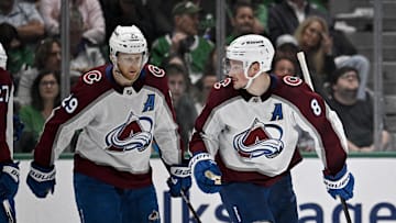 Colorado Avalanche center Nathan MacKinnon (29) and defenseman Cale Makar (8)