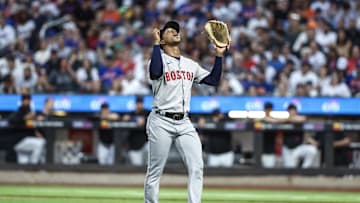 Boston Red Sox starting pitcher Brayan Bello (66) celebrates after the  first inning against the New York Mets at Citi Field in 2024.
