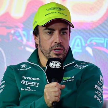 Nov 15, 2023; Las Vegas, Nevada, USA; Aston Martin driver Fernando Alonso of Spain speaks during media availabilities at Las Vegas Strip Circuit. Mandatory Credit: Gary A. Vasquez-Imagn Images