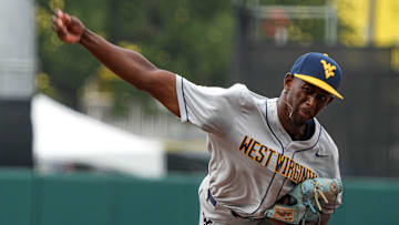 West Virginia pitcher Carlson Reed (17) throws a pitch against the Texas Longhorns at UFCU Disch-Falk Field on Saturday, May 20, 2023 in Austin.