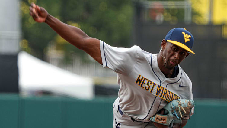 West Virginia pitcher Carlson Reed (17) throws a pitch against the Texas Longhorns at UFCU Disch-Falk Field on Saturday, May 20, 2023 in Austin.