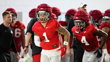 Ohio State Buckeyes wide receivers Brandon Inniss (1) and Jeremiah Smith (4) run during spring football practice at the Woody Hayes Athletic Center on March 17, 2025.