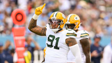 Sep 22, 2024; Nashville, Tennessee, USA;  Green Bay Packers defensive end Preston Smith (91)celebrates his sack against the Tennessee Titans during the second half at Nissan Stadium. Mandatory Credit: Steve Roberts-Imagn Images