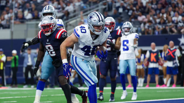 Dallas Cowboys running back Hunter Luepke (40) scores a touchdown during the second half against the New England Patriots