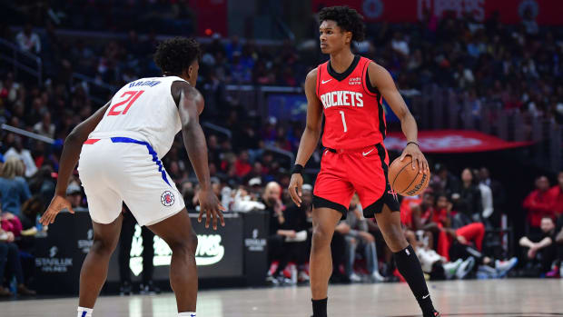 Apr 14, 2024; Los Angeles, California, USA; Houston Rockets forward Amen Thompson (1) controls the ball