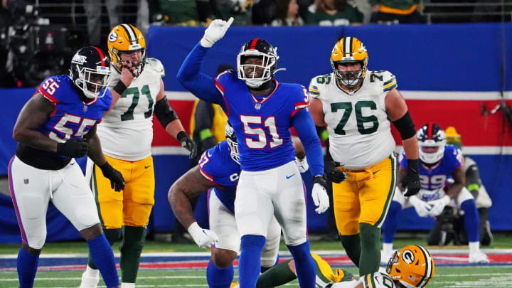 Dec 11, 2023; East Rutherford, New Jersey, USA; New York Giants linebacker Azeez Ojulari (51) celebrates after making a sack on Green Bay Packers quarterback Jordan Love (10) during the fourth quarter at MetLife Stadium. Mandatory Credit: Robert Deutsch-USA TODAY Sports