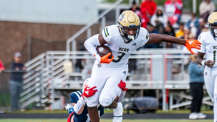 Detroit Country Day's Anthony Cartwright rushes during a football game on Saturday, Sept. 6, 2025, at Joseph P. Healey Field.