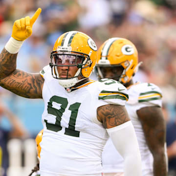 Sep 22, 2024; Nashville, Tennessee, USA;  Green Bay Packers defensive end Preston Smith (91)celebrates his sack against the Tennessee Titans during the second half at Nissan Stadium. Mandatory Credit: Steve Roberts-Imagn Images
