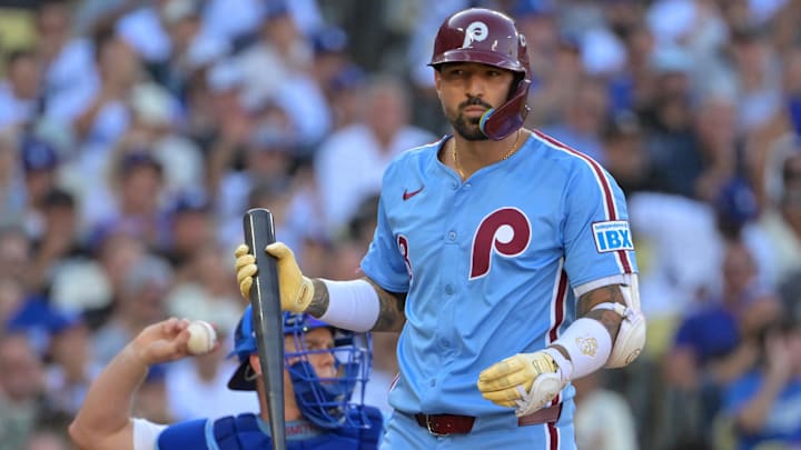 Nick Castellanos (8) reacts after striking out in the fifth inning against the Los Angeles Dodgers.