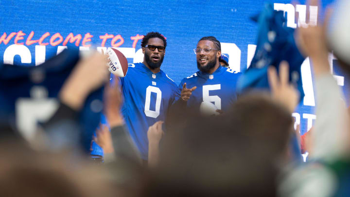 Apr 25, 2024; East Rutherford, NJ, USA; (Left) NY Giants #0 Brian Burns and #5 Kayvon Thibodeaux during the NY Giants and NY Jets draft party at MetLife Stadium.