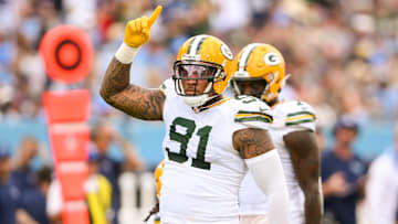 Sep 22, 2024; Nashville, Tennessee, USA;  Green Bay Packers defensive end Preston Smith (91)celebrates his sack against the Tennessee Titans during the second half at Nissan Stadium. Mandatory Credit: Steve Roberts-Imagn Images