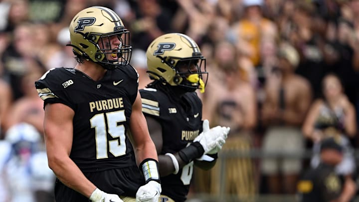 Purdue Boilermakers defensive end Will Heldt (15) celebrates a sack 