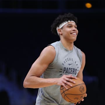 Mar 8, 2025; Atlanta, Georgia, USA; Indiana Pacers forward Enrique Freeman (8) warms up on the court before the game against the Atlanta Hawks at State Farm Arena. Mandatory Credit: Mady Mertens-Imagn Images