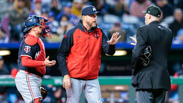 Minnesota Twins manager Rocco Baldelli argues with the home plate umpire after a call during the sixth inning against the Kansas City Royals at Kauffman Stadium in Kansas City, Mo., on April 7, 2025.