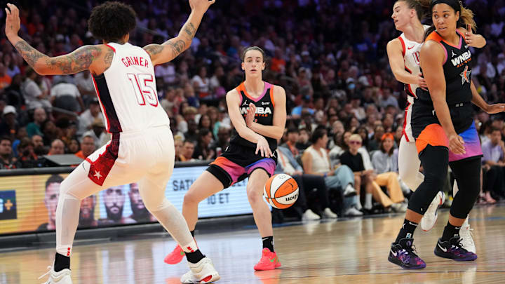 Caitlin Clark makes a pass in the WNA All-Star game.