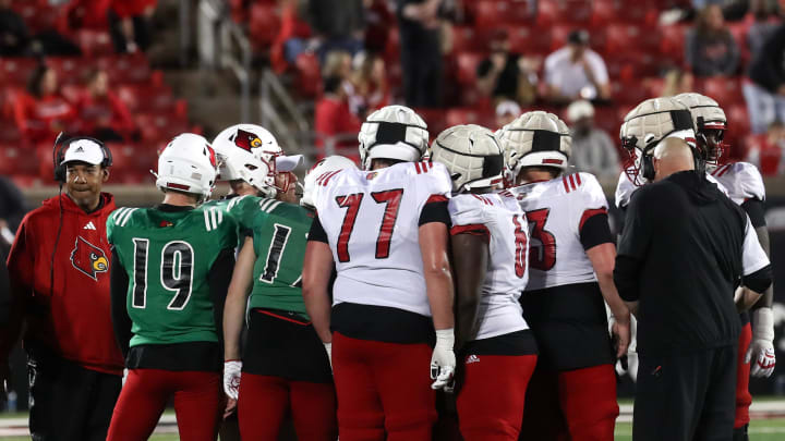 Louisville's offense took a timeout against Louisville’s defense at L&N Stadium during the spring game.