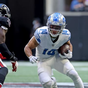 Amon Ra St. Brown (14) and the Detroit Lions came up short against the Atlanta Falcons in 2021 en route to an embarrassing 3-13-1 season.