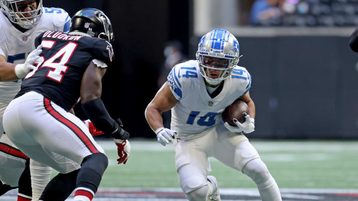 Amon Ra St. Brown (14) and the Detroit Lions came up short against the Atlanta Falcons in 2021 en route to an embarrassing 3-13-1 season.