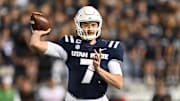 Oct 11, 2024; Logan, Utah, USA;  Utah State Aggies quarterback Spencer Petras (7) passes in the second half against the UNLV Rebels at Merlin Olsen Field at Maverik Stadium. Mandatory Credit: Jamie Sabau-Imagn Images