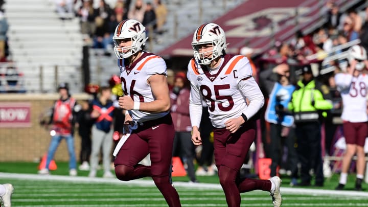 Nov 11, 2023; Chestnut Hill, Massachusetts, USA; Virginia Tech Hokies tight end Nick Gallo (86) and tight end Ja'Ricous Hairston (85) run onto the field during the first half against the Boston College Eagles at Alumni Stadium. Mandatory Credit: Eric Canha-USA TODAY Sports