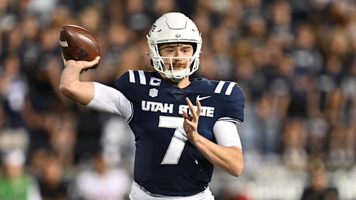 Oct 11, 2024; Logan, Utah, USA; Utah State Aggies quarterback Spencer Petras (7) passes in the second half against the UNLV Rebels at Merlin Olsen Field at Maverik Stadium. Mandatory Credit: Jamie Sabau-Imagn Images Oct 11, 2024; Logan, Utah, USA; Utah State Aggies quarterback Spencer Petras (7) passes in the second half against the UNLV Rebels at Merlin Olsen Field at Maverik Stadium. Mandatory Credit: Jamie Sabau-Imagn Images