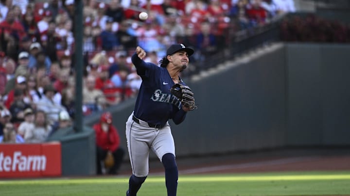 Seattle Mariners first baseman Josh Rojas (4) throws to first base for an out against the St. Louis Cardinals in the first inning at Busch Stadium on Sept 7.