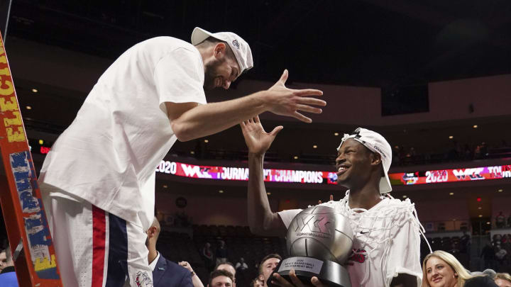 Gonzaga Bulldogs forward Killian Tillie (33) celebrates after cutting the net against the Saint Mary's Gaels after the championship game in the WCC Basketball Tournament at Orleans Arena. 